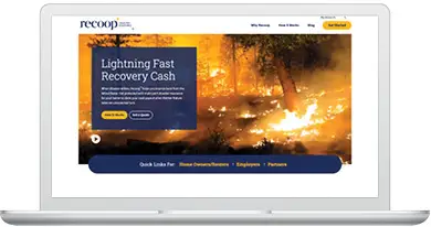 recoop disaster insurance website homepage displayed on a white laptop.
