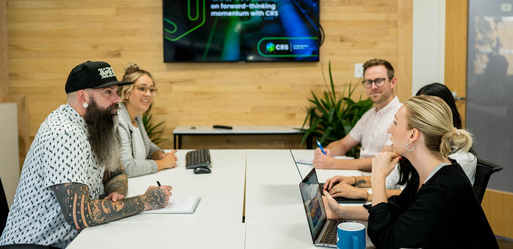 team talking in the youtube room at west48 private event space.